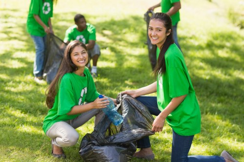 Sorted recyclable materials being processed by muck away services